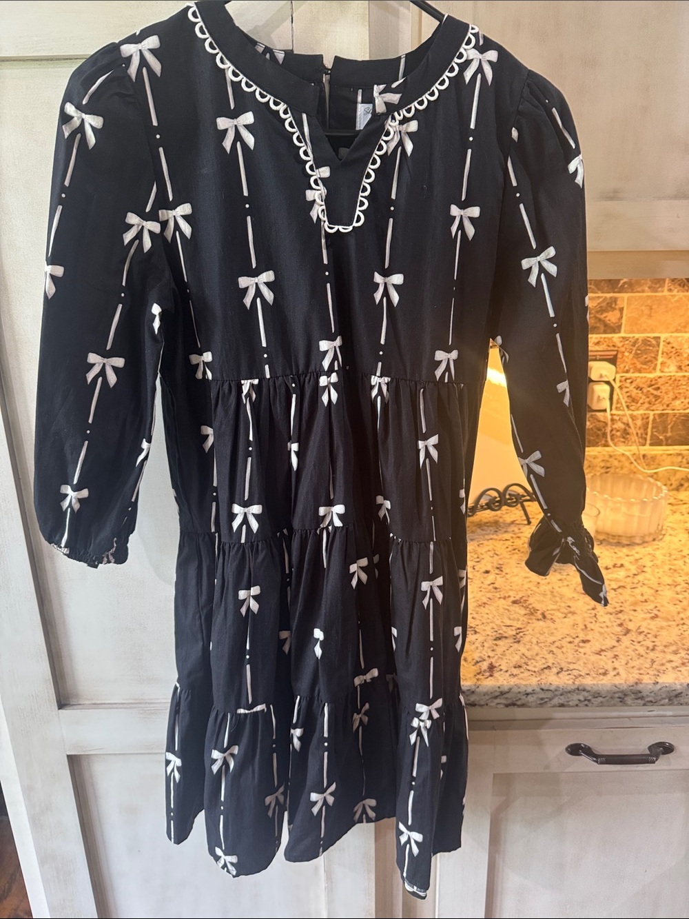 Shop The Mint Girls Black Bow Print Tiered Dress - White Bows
